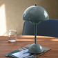 Flowerpot VP9 Akkuleuchte von &tradition in stone blue.